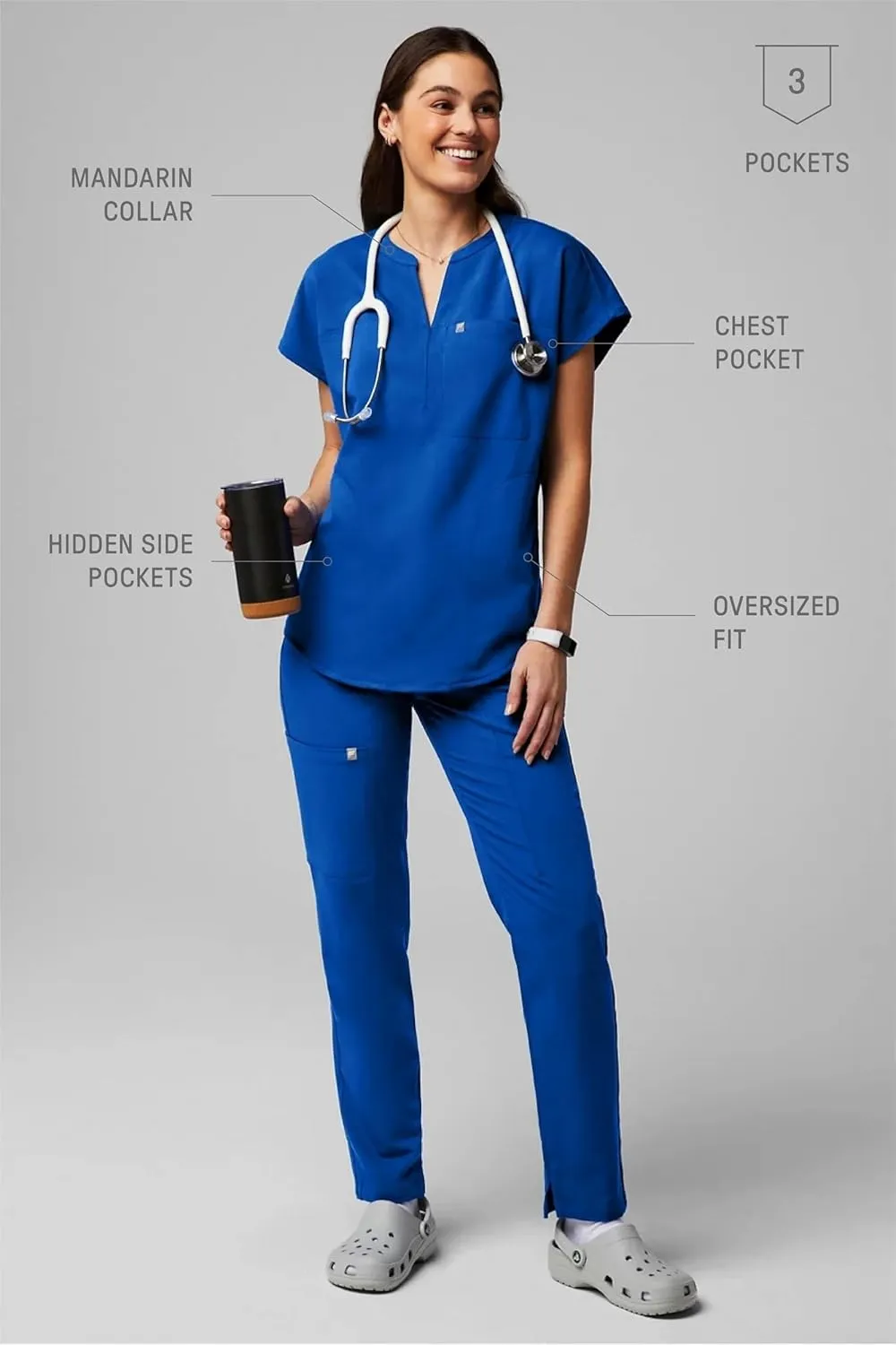 Fabletics Women's Evolve 3-Pocket Scrub Top with an Oversized Fit - MotionTech, 4-Way Stretch, Wrinkle-Resist, Anti-Shrink