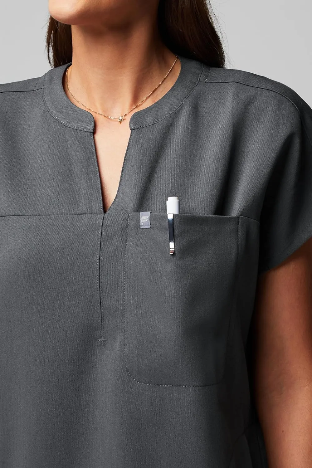 Fabletics Women's Evolve 3-Pocket Scrub Top with an Oversized Fit - MotionTech, 4-Way Stretch, Wrinkle-Resist, Anti-Shrink