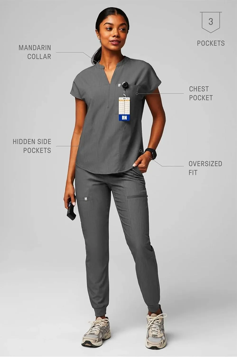Fabletics Women's Evolve 3-Pocket Scrub Top with an Oversized Fit - MotionTech, 4-Way Stretch, Wrinkle-Resist, Anti-Shrink